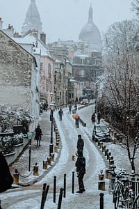 Snow in Paris street, France