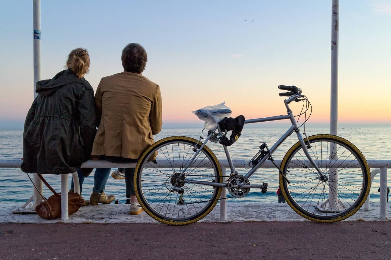 Bicycle lovers enjoying a beautiful sunset over the Mediterranean in Provence, France