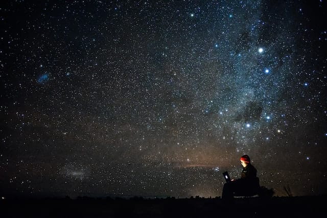 digital nomad under the stars of Atacama Desert, Chile